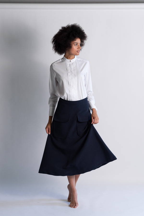 Gonna midi con tasconi.